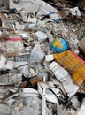 Garbage dump. Broken terrestrial globe in the garbage