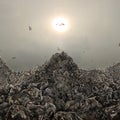 Garbage dump in form of mountains on a gloomy background Royalty Free Stock Photo