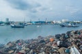 Garbage dump near ocean view full of smoke, litter, plastic bottles,rubbish and trash at the Thilafushi local tropical island Royalty Free Stock Photo