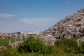 Garbage dump outside the city in the open air Royalty Free Stock Photo