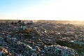 Garbage dump with waste plastic, polyethylene and food waste. Trash disposal for recycling and re-use. Bulldozer at landfill