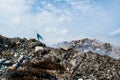 Garbage dump zone view full of smoke, litter, plastic bottles,rubbish and trash at the Thilafushi local tropical island Royalty Free Stock Photo