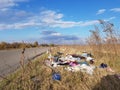 Garbage dumped on the side of the road Royalty Free Stock Photo
