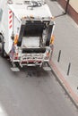 Garbage dustcart truck on city street Royalty Free Stock Photo