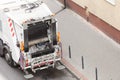 Garbage dustcart truck on city street Royalty Free Stock Photo