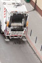 Garbage dustcart truck on city street Royalty Free Stock Photo