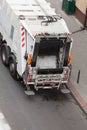 Garbage dustcart truck on city street