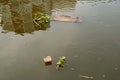 Garbage floating on the river for the concept of water pollution