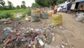 Garbage gatherers assorting trashes in slums