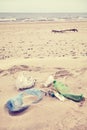 Garbage left on a beach, environmental pollution concept. Royalty Free Stock Photo