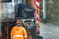 Garbage man collecting the bins Royalty Free Stock Photo