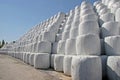 Garbage. Packing bales with garbage with tractor machines, place for making bales with garbage, Wrapped stacked bales