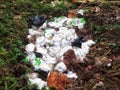garbage pit, visible piles of baby diaper rubbish