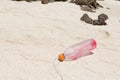 The garbage  plastic bottle was litter on sand beach Royalty Free Stock Photo