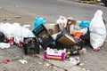 Garbage remains on the street at the site of the street market in the city of Milan.