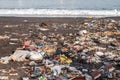 Garbage on a sandy polluted beach