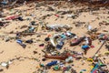 Garbage on sea beach, dirty ocean water, environmental pollution, ecology, waste, rubbish, plastic, trash, refuse, litter Royalty Free Stock Photo