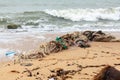 Garbage on sea beach, dirty ocean water, environmental pollution, ecology, waste, rubbish, plastic, trash, refuse, litte Royalty Free Stock Photo