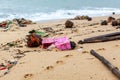 Garbage on sea beach, dirty ocean water, environmental pollution, ecology, waste, rubbish, plastic, trash, refuse, litter Royalty Free Stock Photo