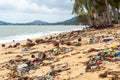 Garbage on sea beach, dirty ocean water, environmental pollution, ecology, waste, rubbish, plastic, trash, refuse, litter Royalty Free Stock Photo