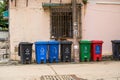 Garbage sorting bins in a residential area. Translation: Other garbage, recyclables. Royalty Free Stock Photo