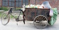 A garbage tricycle cart carrying variety of garbage under Swachh Bharat Abhiyan Mission