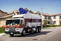 Garbage Truck in Action Royalty Free Stock Photo