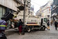 Garbage truck in the morning collecting garbage from the streets of the Old Town of Bucharest, Romania, 2020 Royalty Free Stock Photo