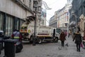 Garbage truck in the morning collecting garbage from the streets of the Old Town of Bucharest, Romania, 2020 Royalty Free Stock Photo