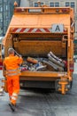 Garbage truck of the municipal garbage disposal collects the garbage