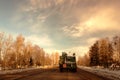 Garbage truck on winter road Royalty Free Stock Photo