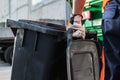 Garbage Truck Worker Moving Trash Can Royalty Free Stock Photo