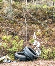 Garbage was illegally disposed of on the side of the road, car tires and other items