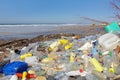 Trash beach pollution with plastics