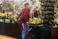 Young visitor at Orchids fascination exhibition in Garching, Germany Royalty Free Stock Photo