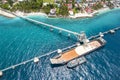 Garcia Hernandez, Bohol, Philippines - Quarried limestone is transported via a belt conveyor into a bulk carrier ship.