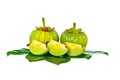 Garcinia cambogia fresh fruit, isolated on white. Fruit for diet Royalty Free Stock Photo