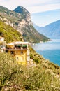 Scenic view from the edge of western coast of Garda lake on beautiful northern Italian nature surrounding this amazing lake. Rocky