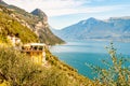 Scenic view from the edge of western coast of Garda lake on beautiful northern Italian nature surrounding this amazing lake. Rocky