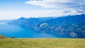 Garda lake with paraglider Royalty Free Stock Photo