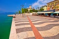 Garda lake turquoise waterfront in town of of Lasize view