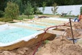 Fiberglass swimming pool construction building Royalty Free Stock Photo