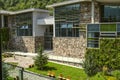 Garden with benches, fountain in the yard between the educational buildings of the International College, in Dilijan,in a reserve