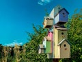 Garden bird house colorful houses bird house shelter birds beach seaside backyard Royalty Free Stock Photo