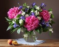 Garden bouquet of peonies, irises and Jasmine in a vase.