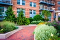 Garden and building along a walkway at Battery Wharf in Boston, Royalty Free Stock Photo