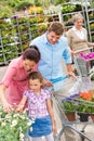 Garden centre family shopping flowers Royalty Free Stock Photo