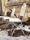 Garden chairs in winter sun Royalty Free Stock Photo