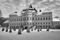 garden and classicist facade of the palace in the village of Rogalin during winter Royalty Free Stock Photo