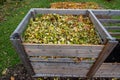 garden compost with one compartment full of leaves